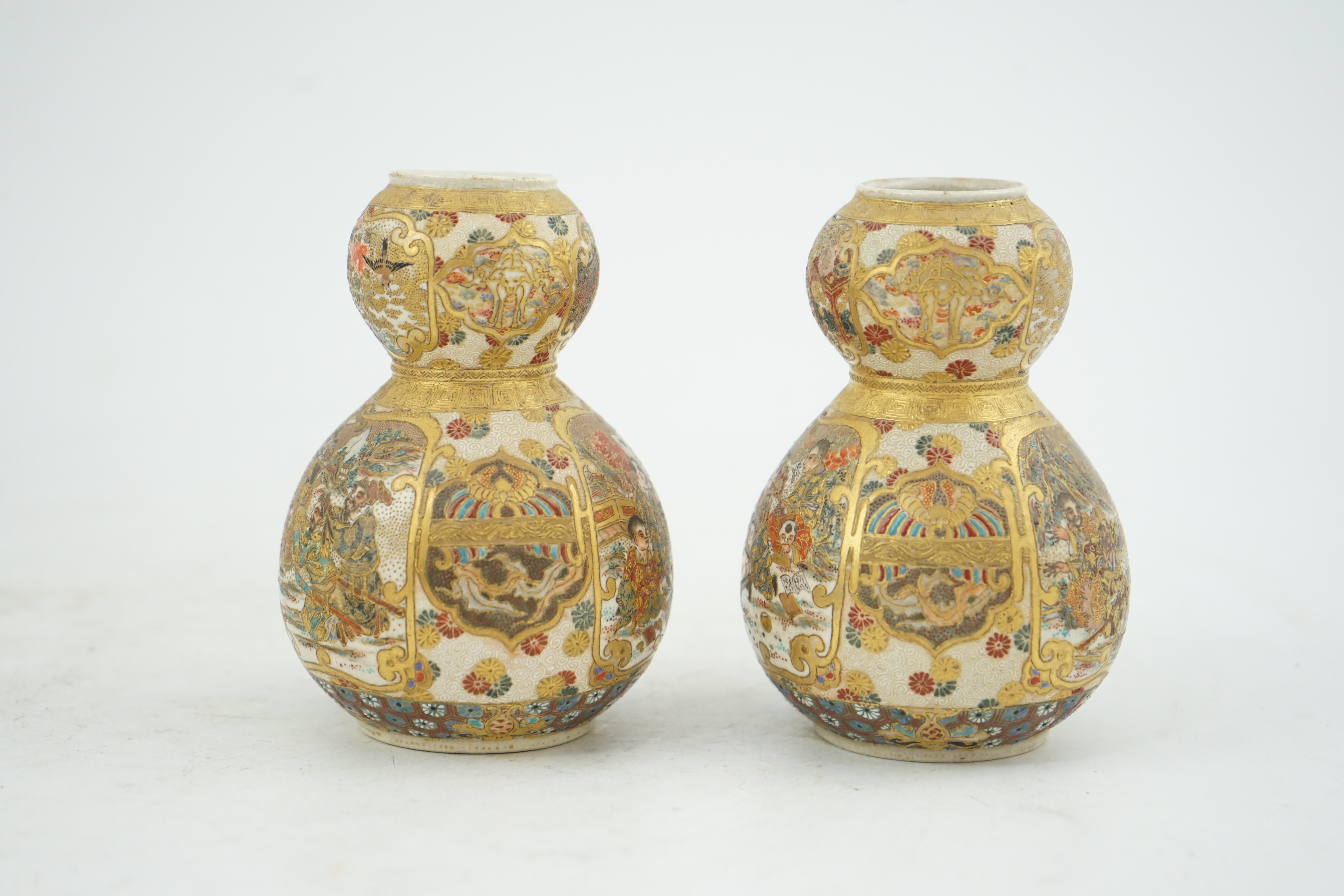 A pair of Japanese Satsuma double gourd-shaped miniature vases, early 20th century